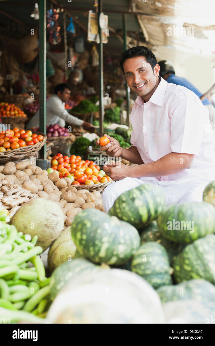 Man buying vegetables from a market stall, Sohna, Gurgaon, Haryana