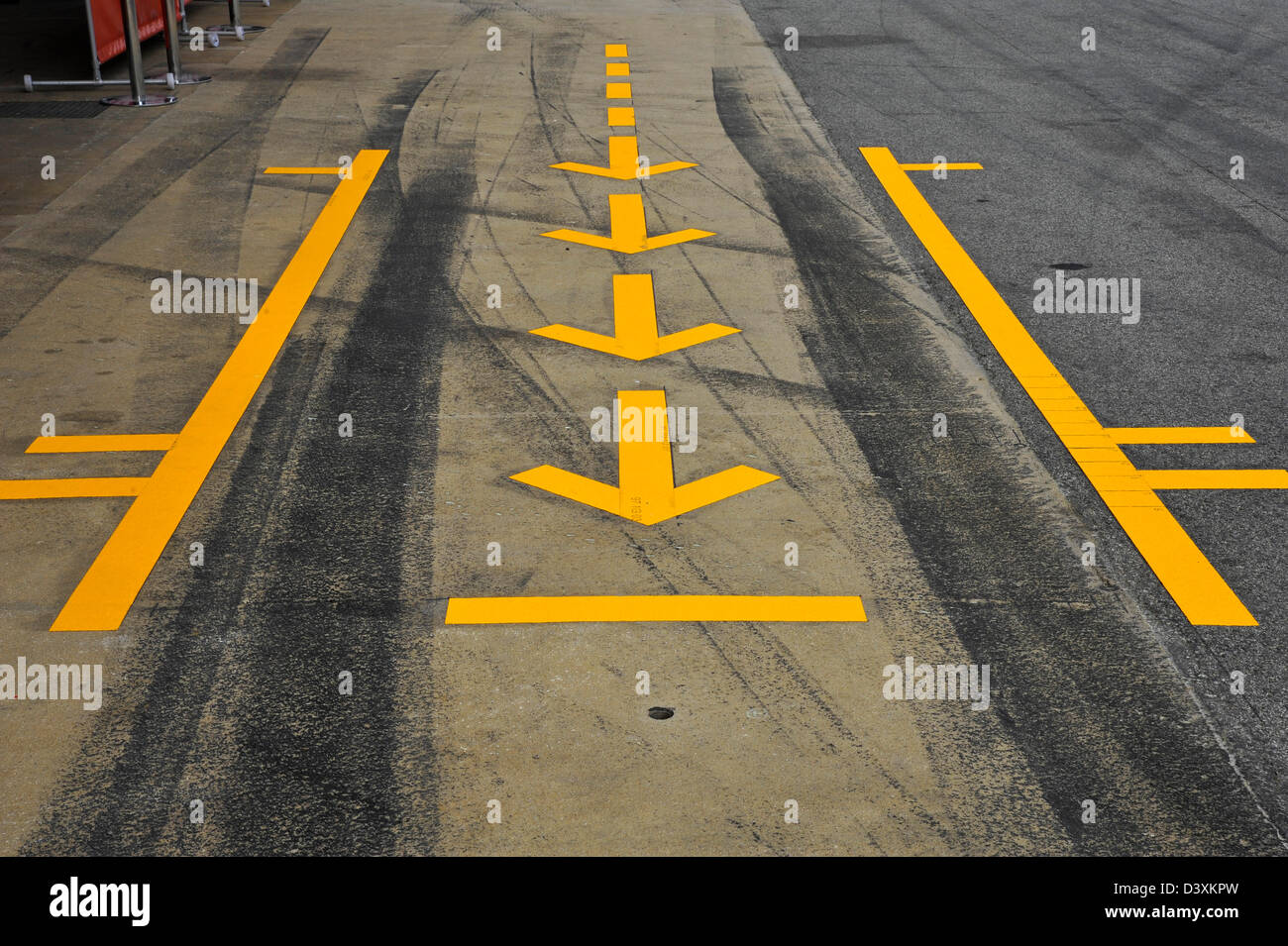 yellow arrow marks in pit stop box during Formula One tests on Circuit de  Catalunya racetrack near Barcelona, Spain in February Stock Photo - Alamy