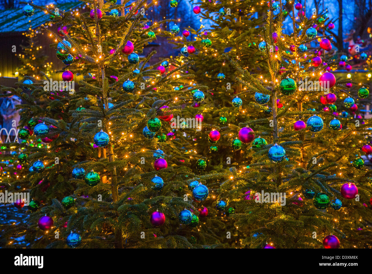 Christmas trees with Christmas baubles. Stock Photo