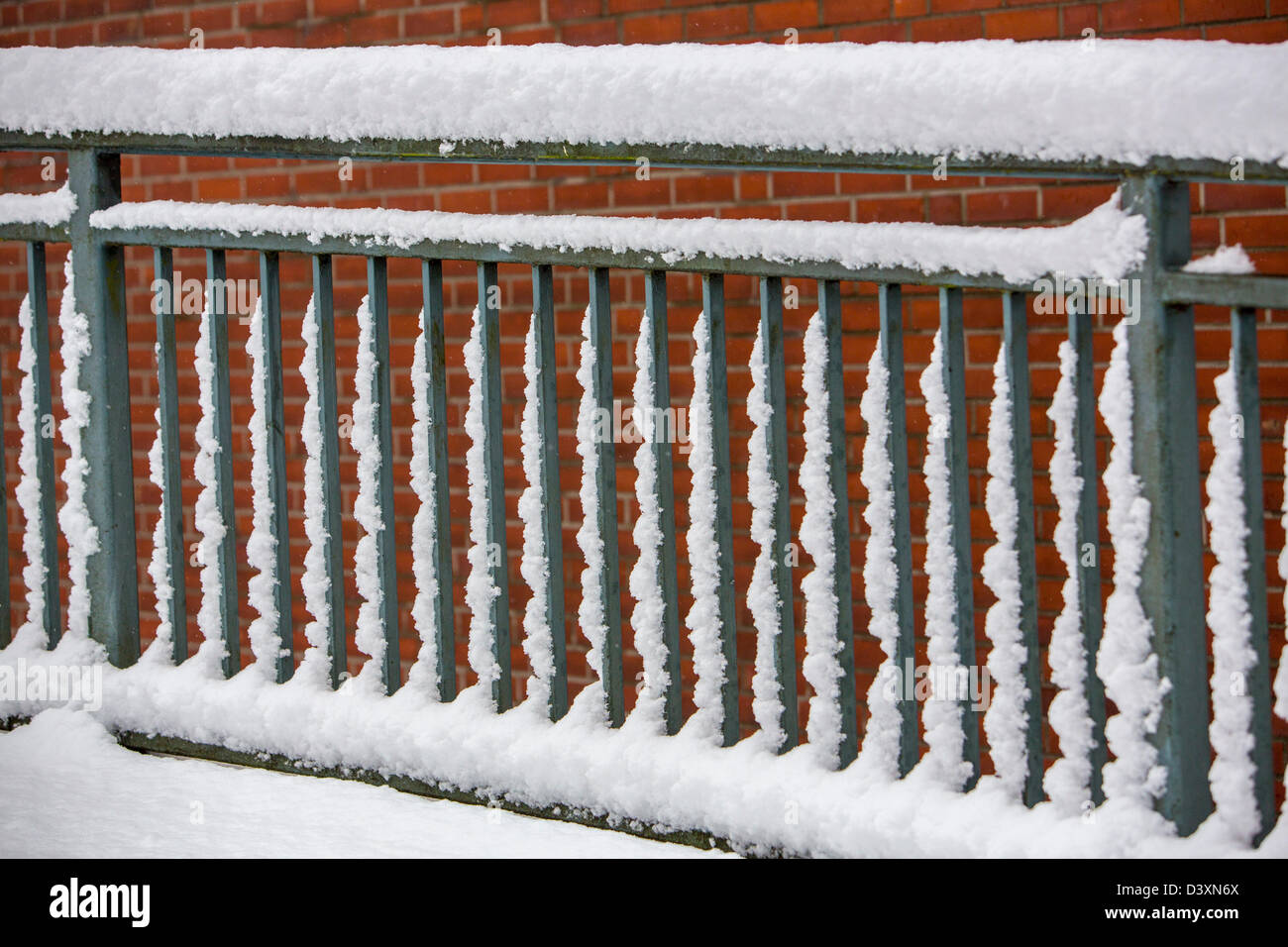 Winter snow-covered grilles, railings Stock Photo - Alamy