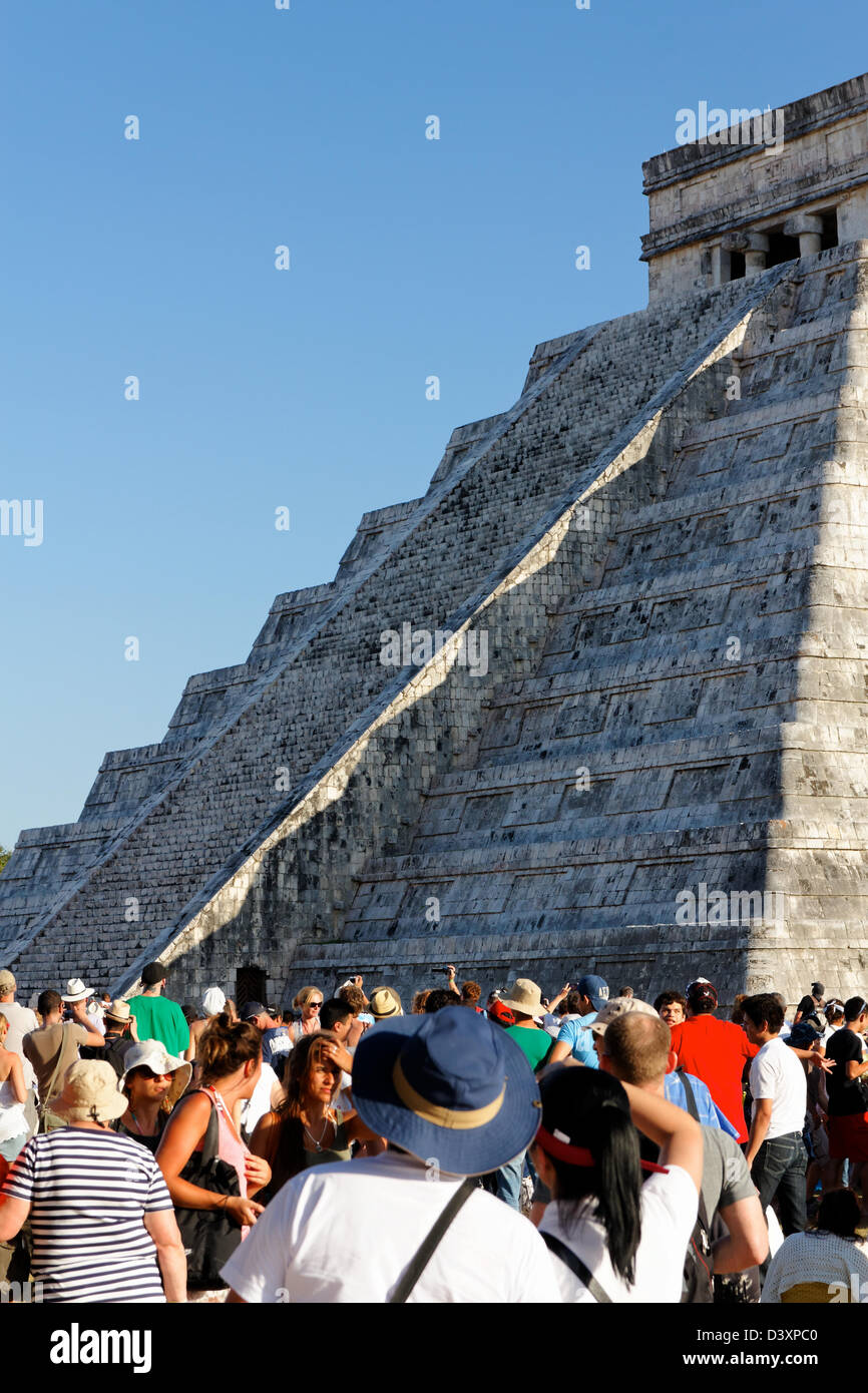 People from all over the world wait for the spring equinox at the Mayan Kukulkan pyramid at Chichen Itza, Yucatan, Mexico. Stock Photo