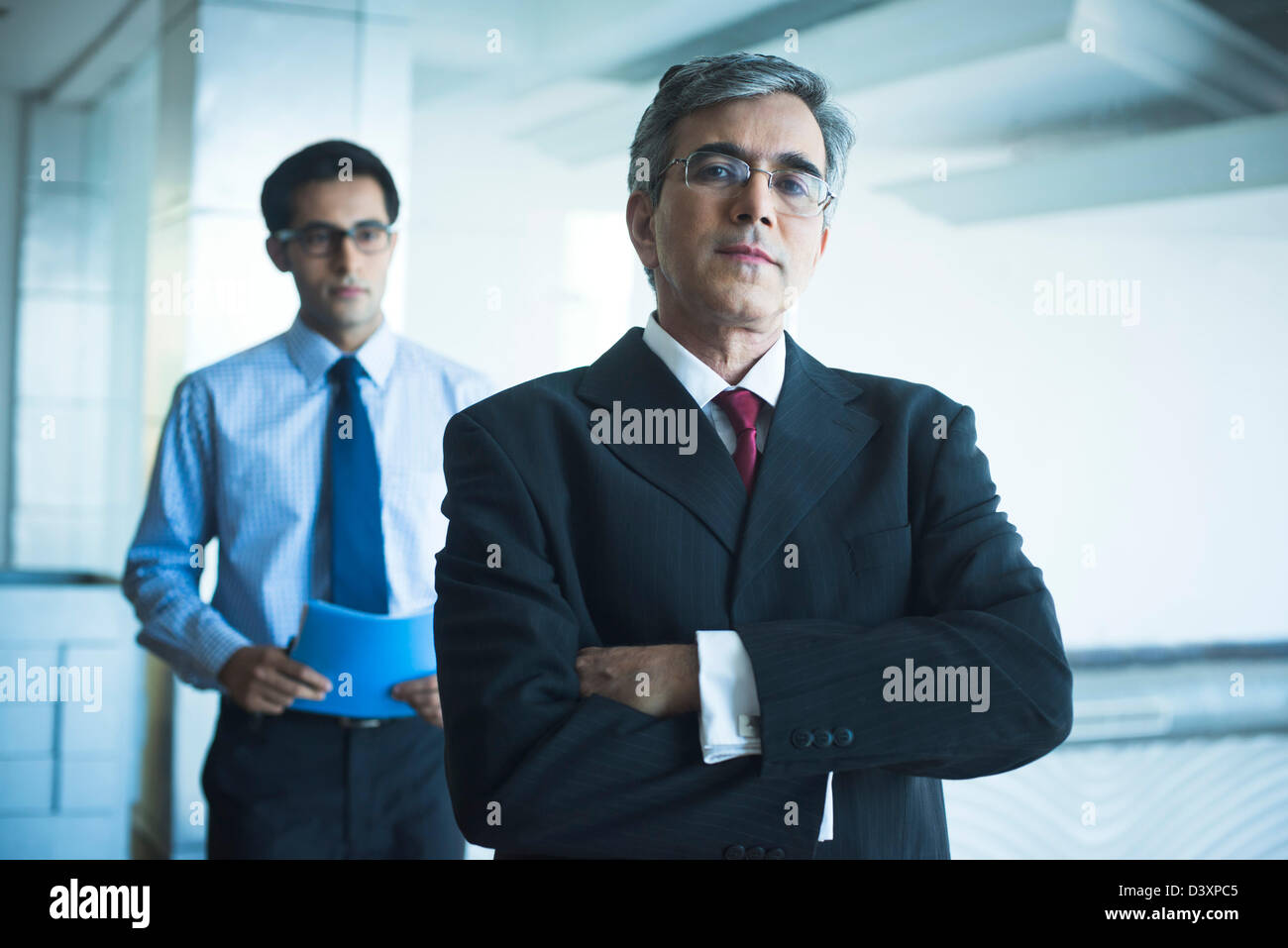 Two businessmen in an office Stock Photo - Alamy