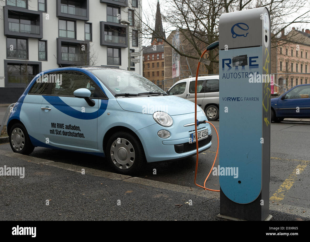 Berlin, Germany, an electric vehicle on a Ladesaeule Stock Photo