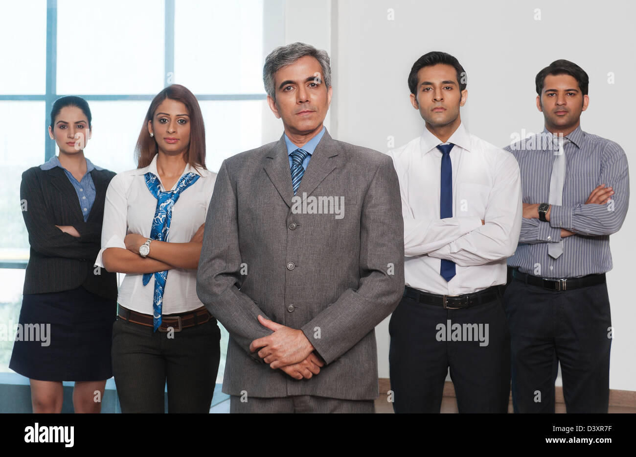 Portrait of business people standing together Stock Photo - Alamy