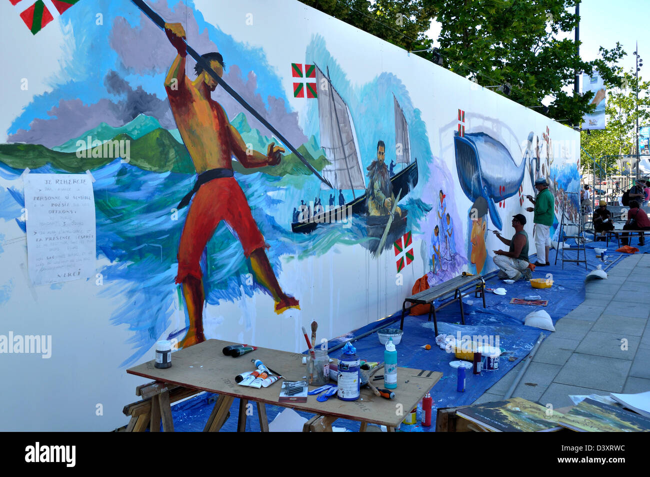 Painters Yvon le Corre, Gildas Flahault and Gaele Flao settled on Vannes quays for the event ('Semaine du Golfe' 2011). Stock Photo