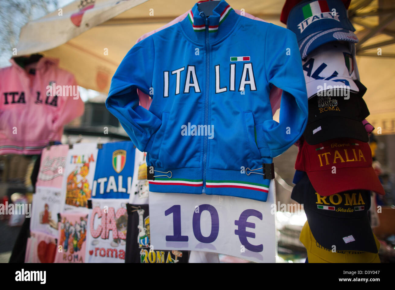 A jacket with the writing 'Italia' is on sale for 10 euros at a market stand in Rome, Italy, 26 February 2013. Weeks of impasses in coalition forming are threating Italy with unforeseeable consequences for the euro. No political party has received a sufficient majority in the parliamentary chambers. Photo: MICHAEL KAPPELER Stock Photo