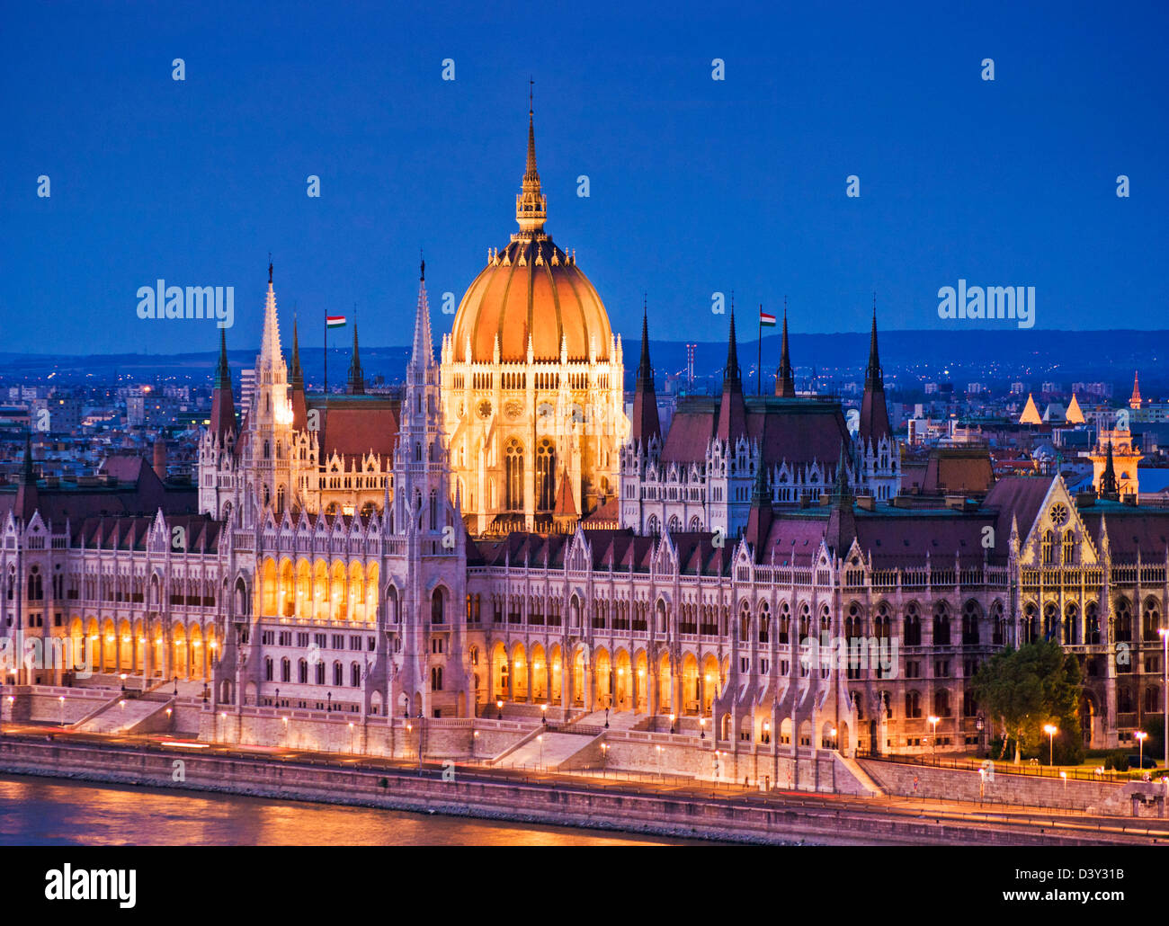 The neo-gothic Hungarian Parliament building, designed by Imre Steindl illuminated at night Budapest, Hungary, Europe, EU Stock Photo