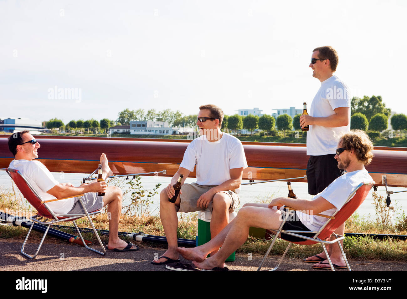members of rowing team hanging out after enjoying a healthy activity
