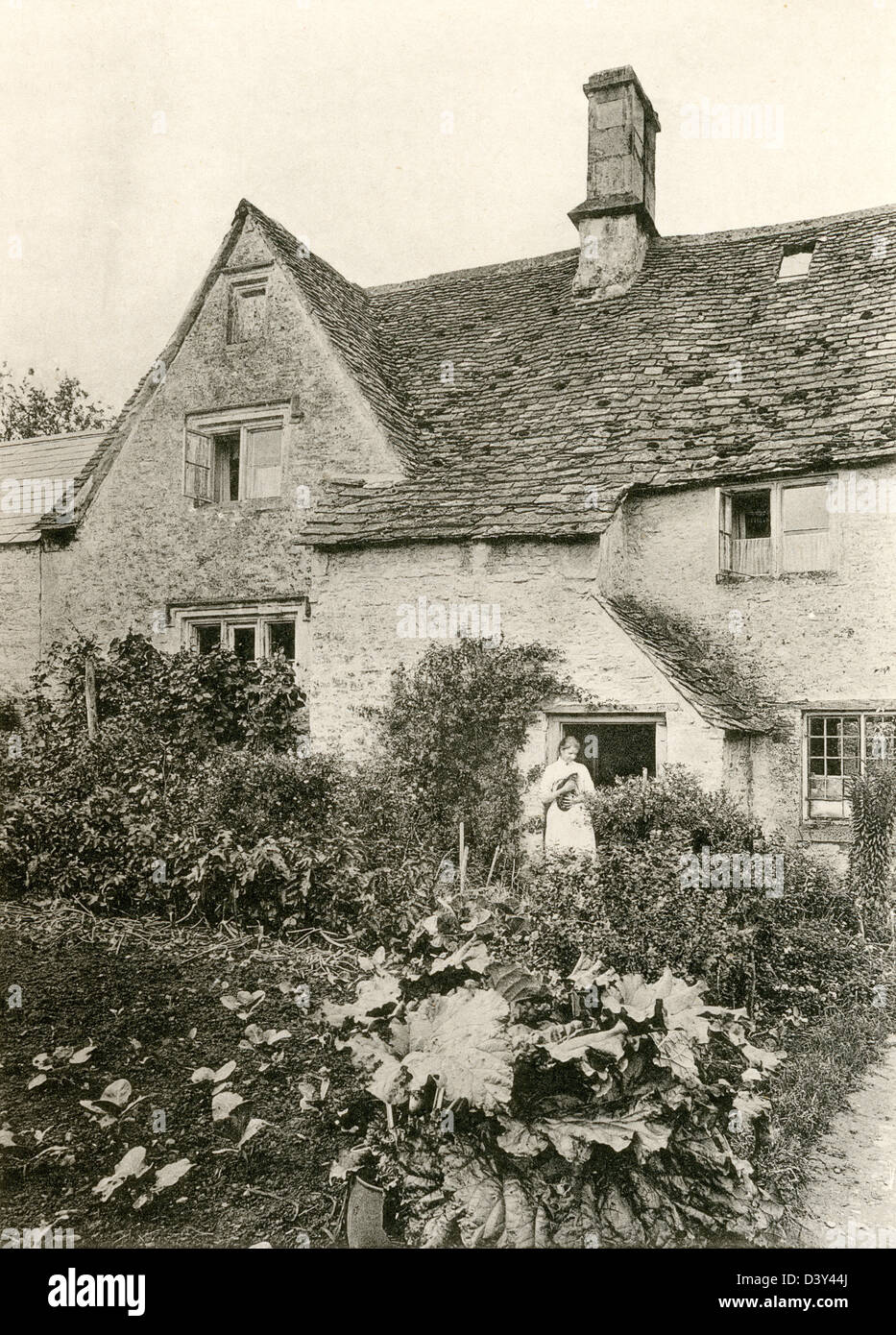 A collotype plate entitled ' A House at Chedworth, Glos.' scanned at high resolution from a book published in 1905. Stock Photo