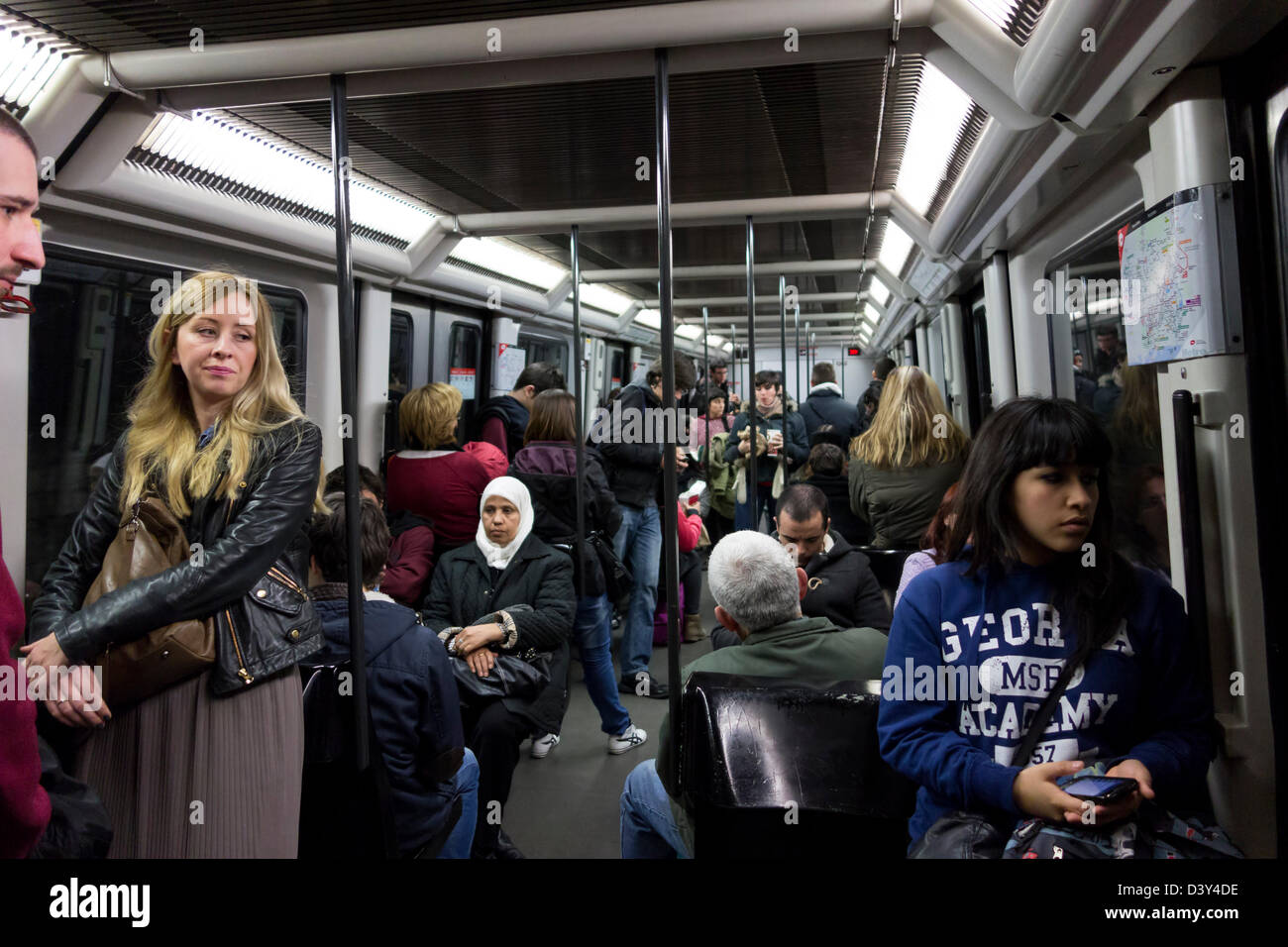 Passengers in an underground tube train, Barcelona, Spain, Europe Stock Photo