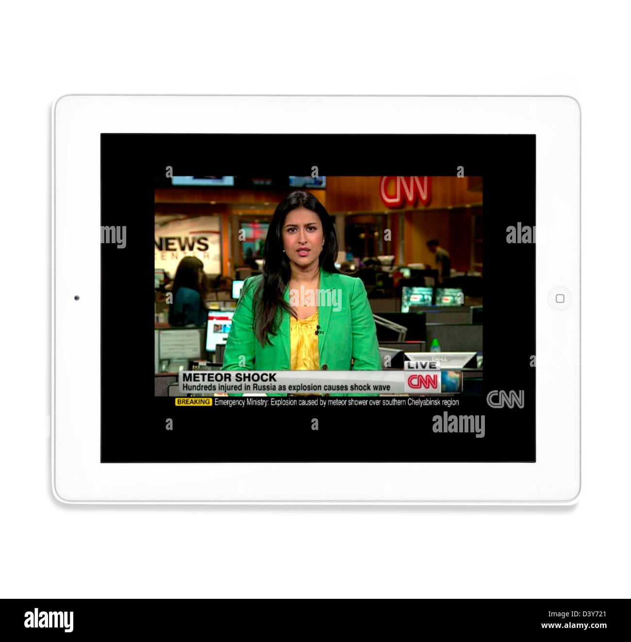 Watching a news broadcast on the CNN News website via a 4th generation Apple iPad Stock Photo