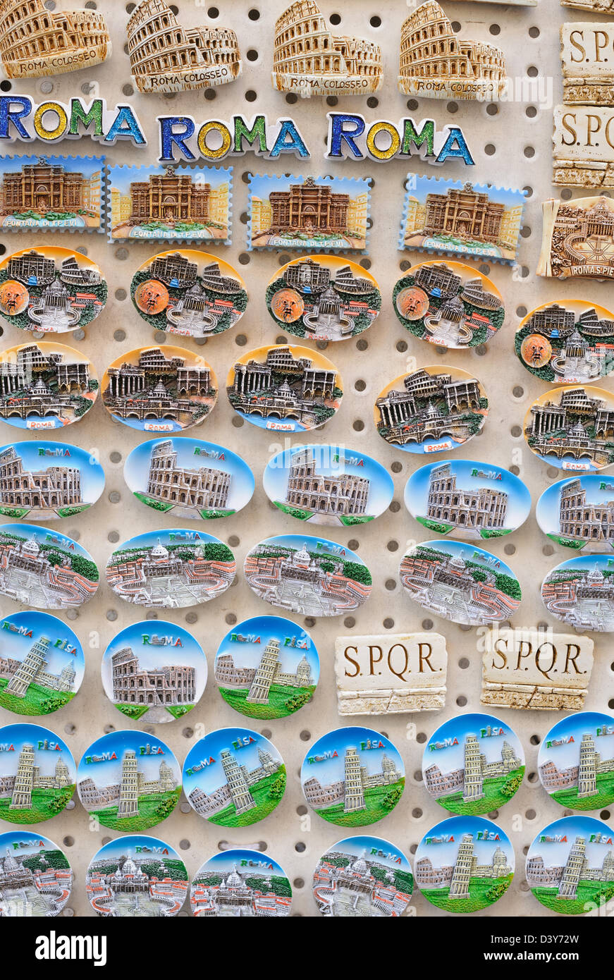 Fridge magnets featuring the tourist sites / sights of Rome in Italy outside a souvenir shop in the City Stock Photo