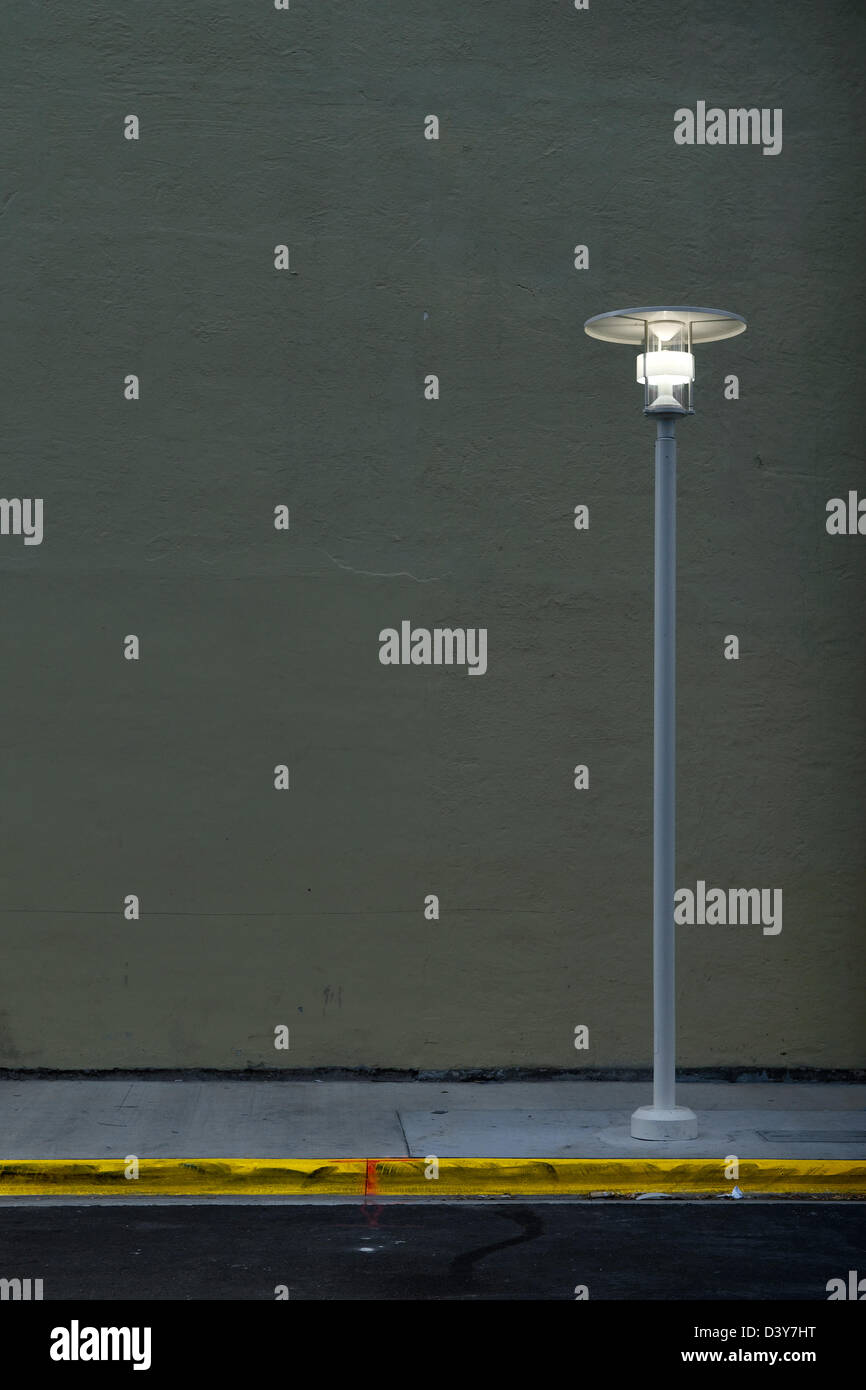 A streetlight on an empty South Beach Miami street. Stock Photo