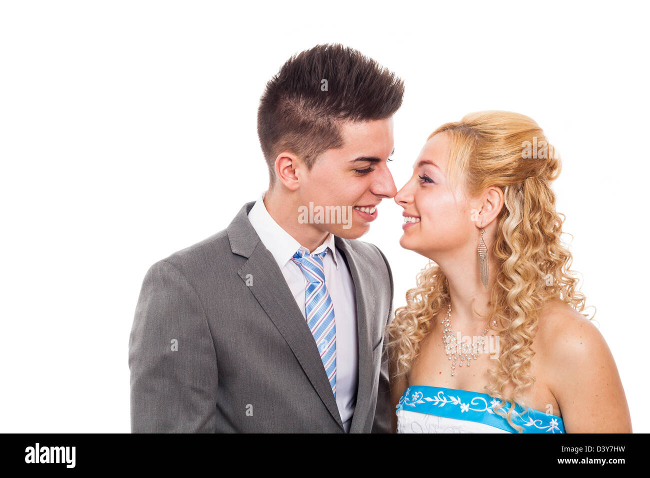 Wedding portrait of happy bride and groom, isolated on white background. Stock Photo