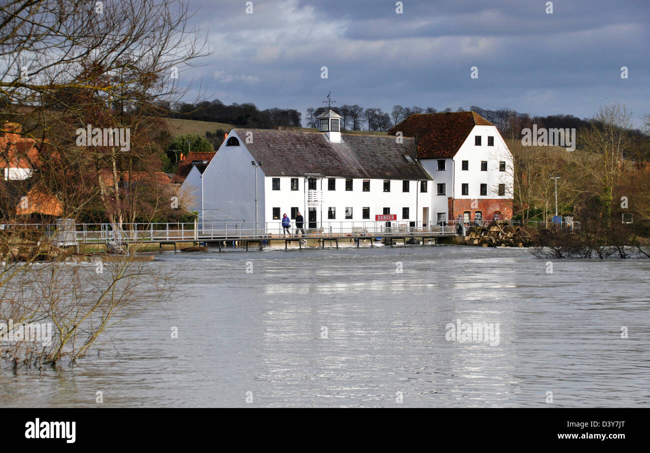 Bucks Hambleden Mill End on the Thames the mill and weir spotlight of winter sun the