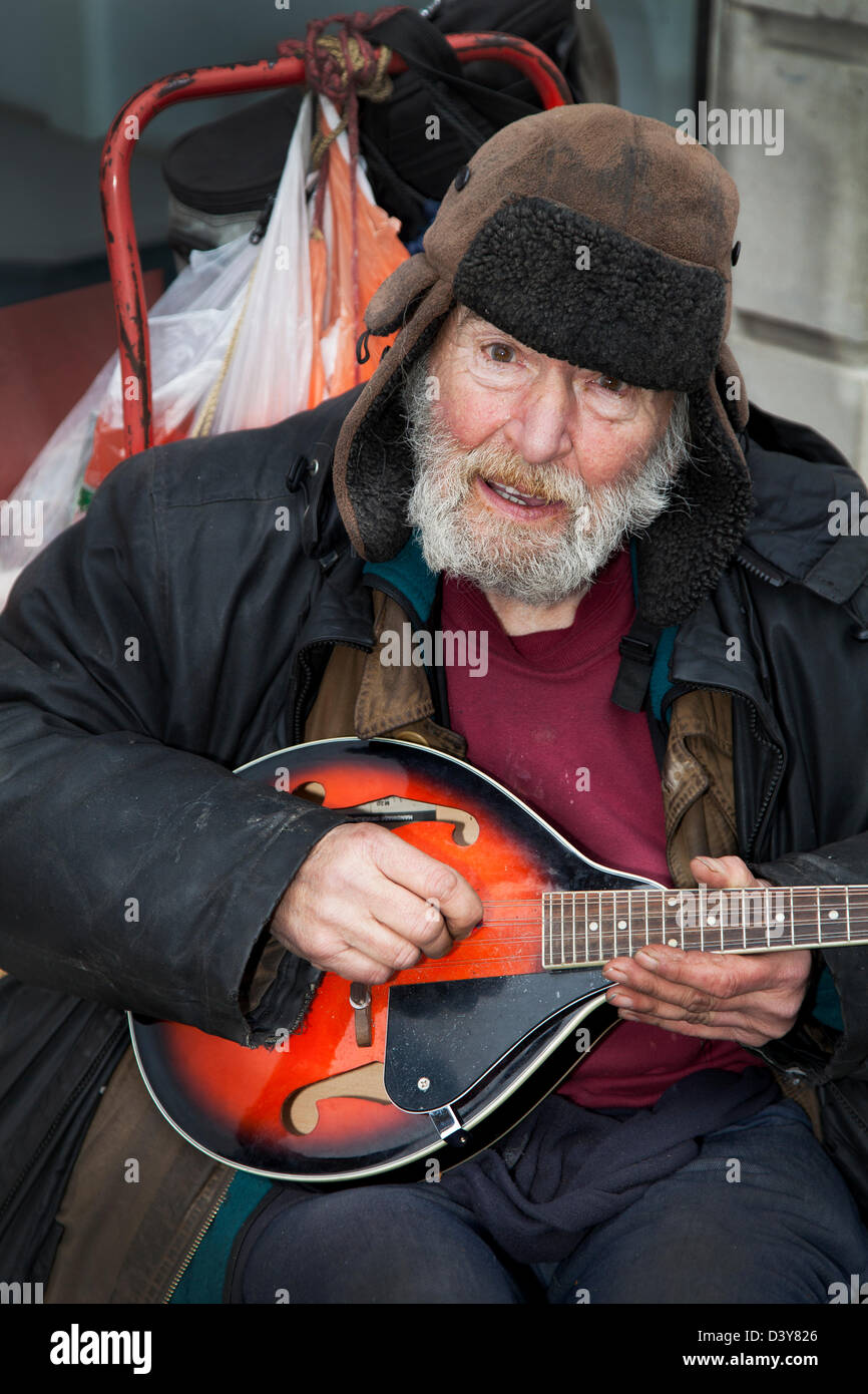 Old man walking bent hi-res stock photography and images - Alamy