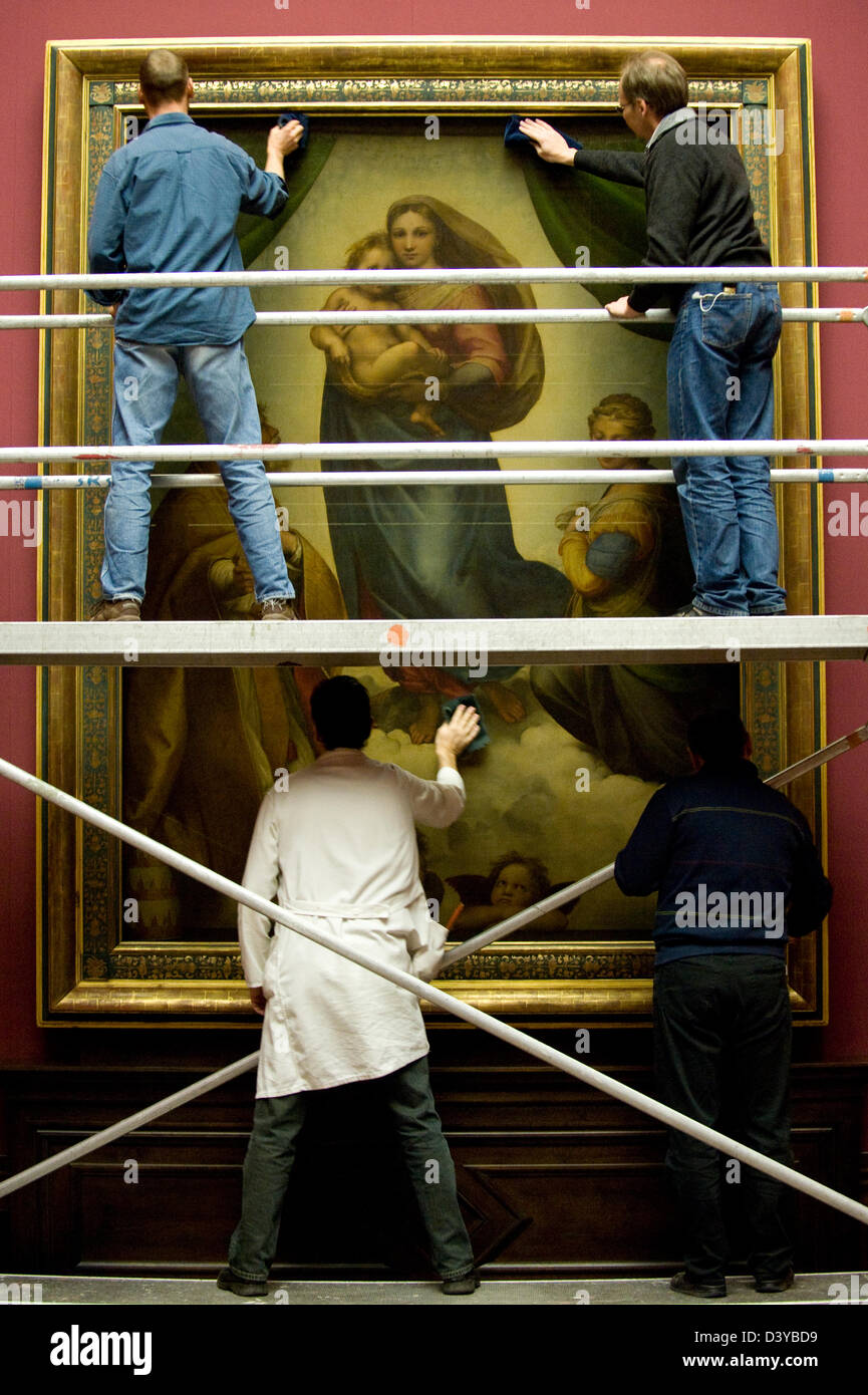 Dresden, Germany, restorers clean the Sistine Madonna by Raphael Stock Photo