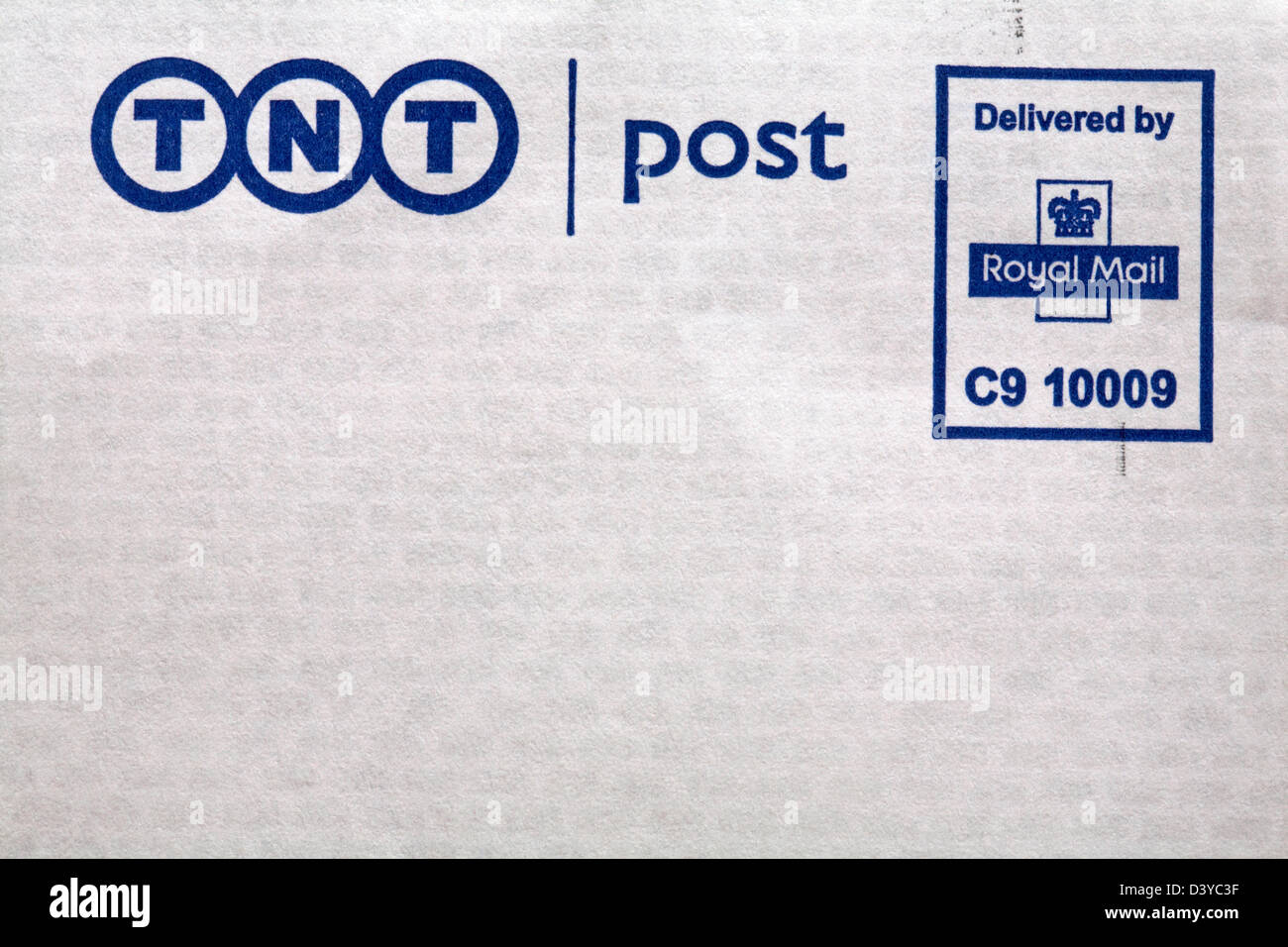TNT Post delivered by Royal Mail information on envelope Stock Photo