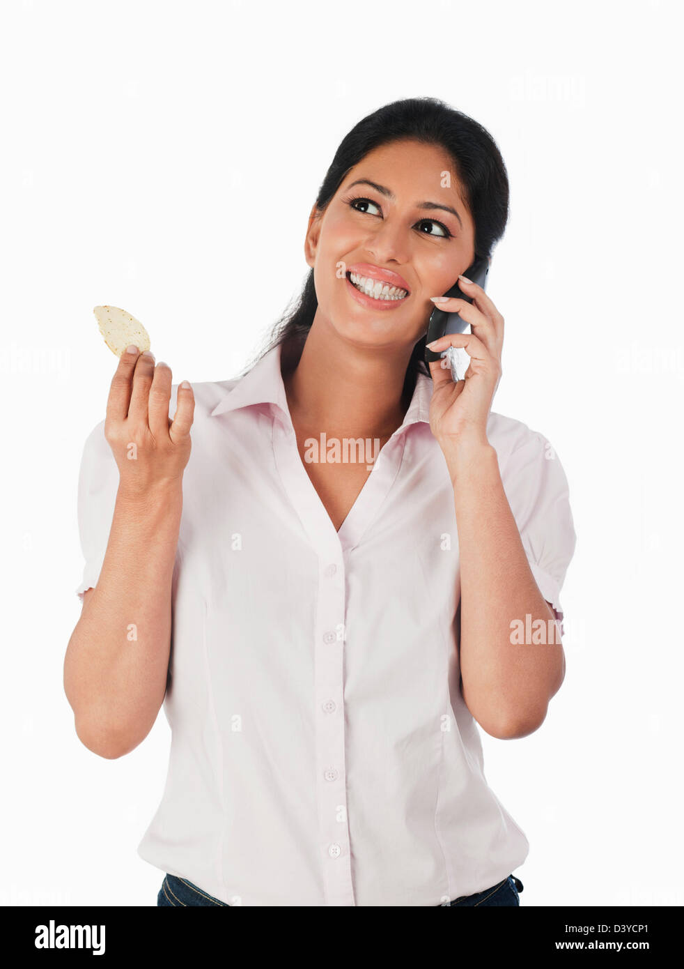 Smiling woman eating food talking Cut Out Stock Images & Pictures - Alamy