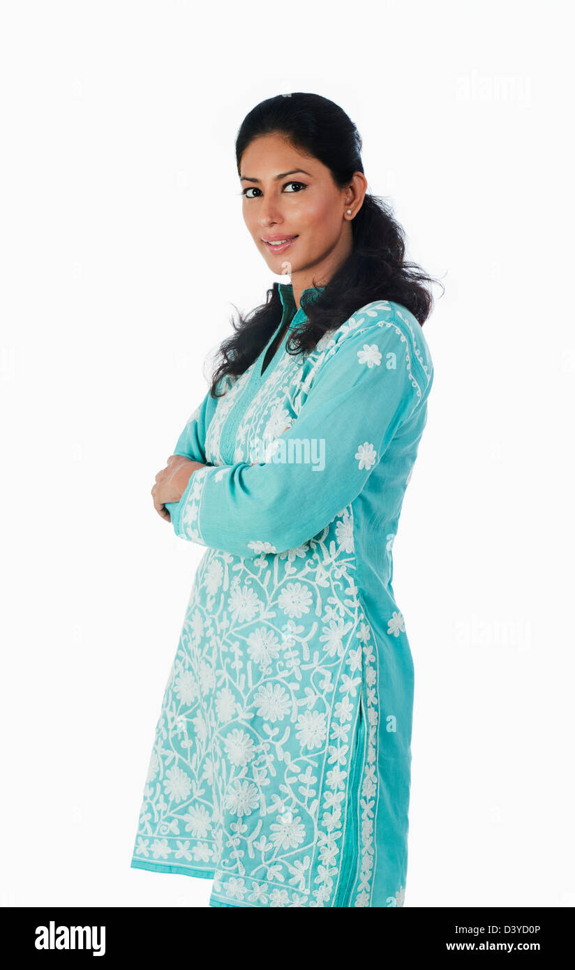 Woman standing with her arms crossed Stock Photo - Alamy