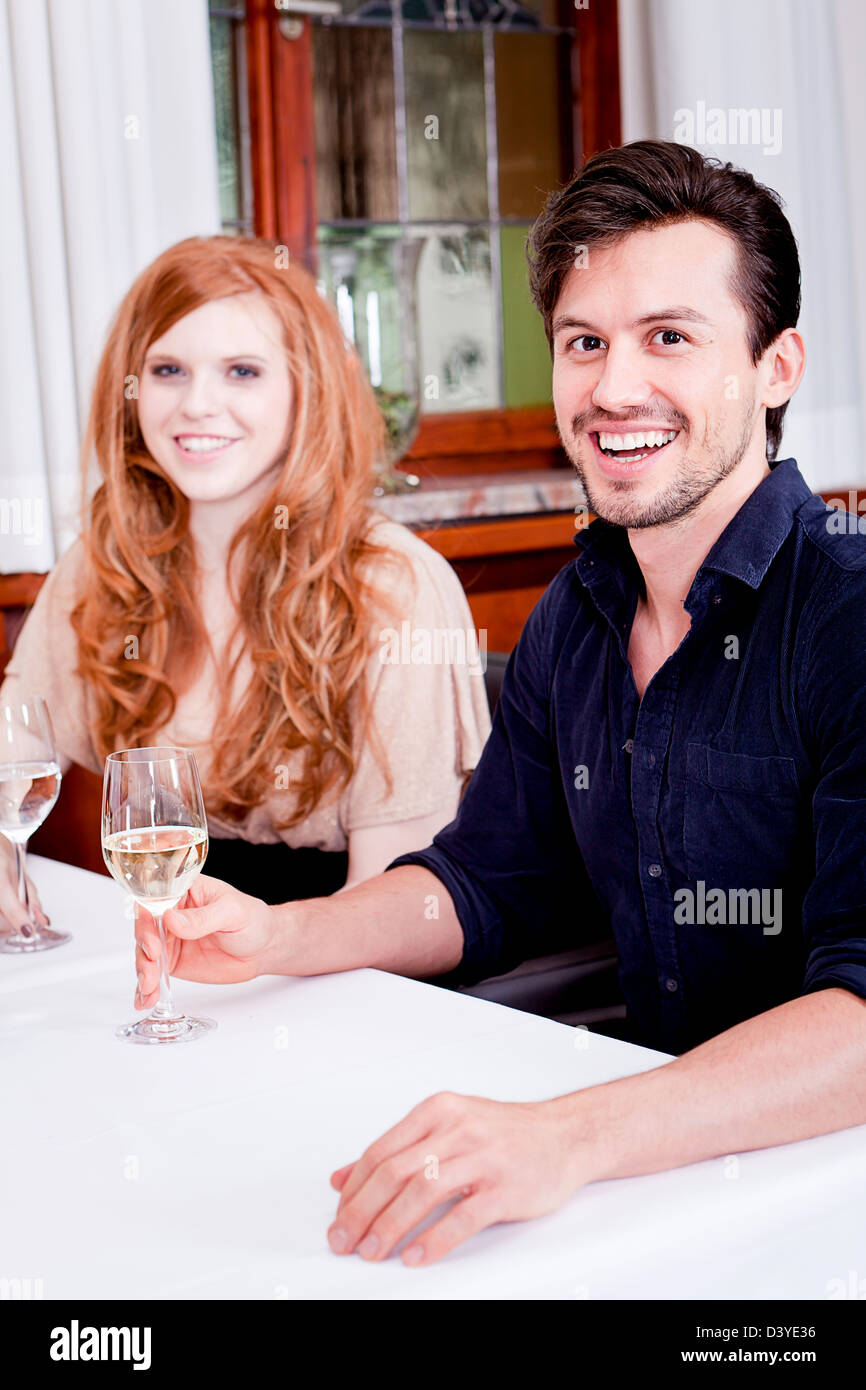 Smiling lovers drinking white hi-res stock photography and images - Alamy
