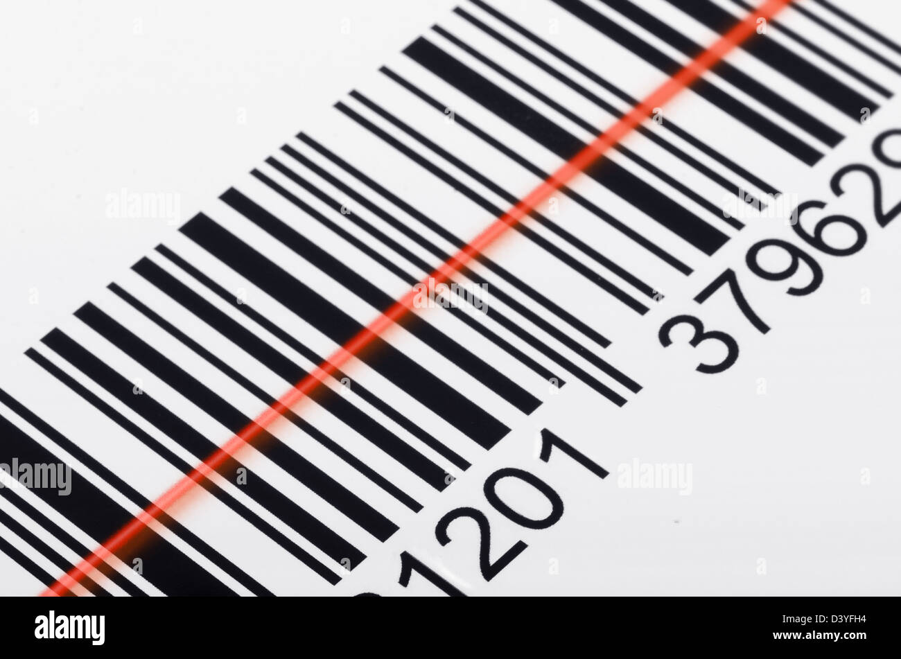 Close-up of barcode with laser scanner beam Stock Photo