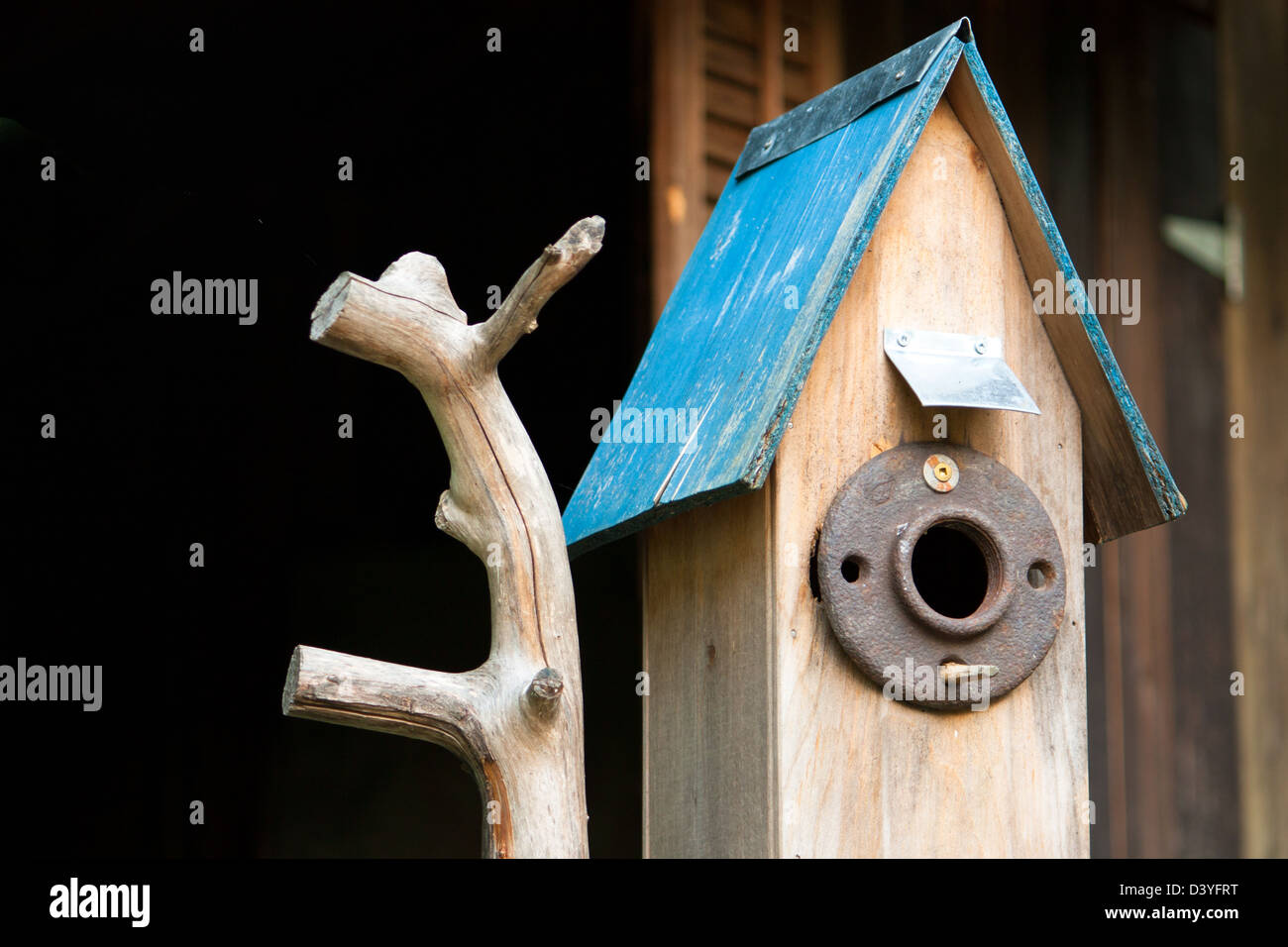 Picture of a rustic birdhouse with blue roof Stock Photo - Alamy