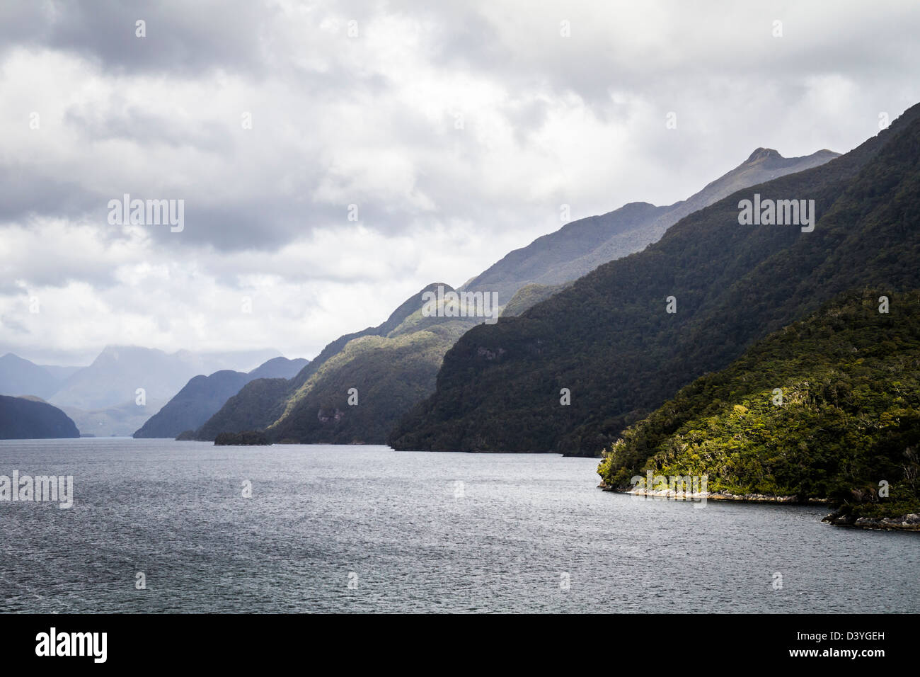 Clouds over the Spectacular Milford Sound, South Island, New Zealand Stock Photo