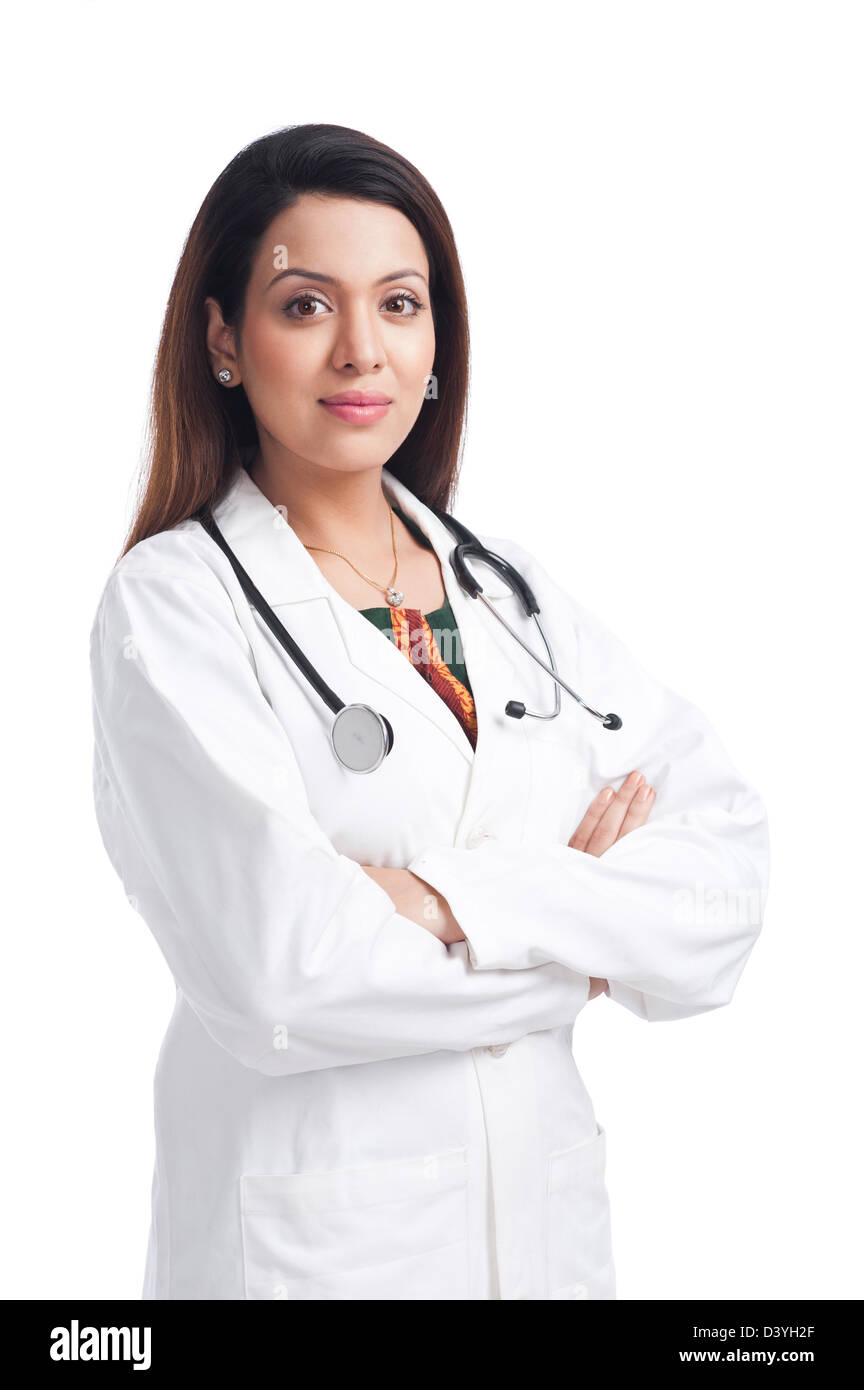 Female doctor standing with her arms crossed Stock Photo - Alamy