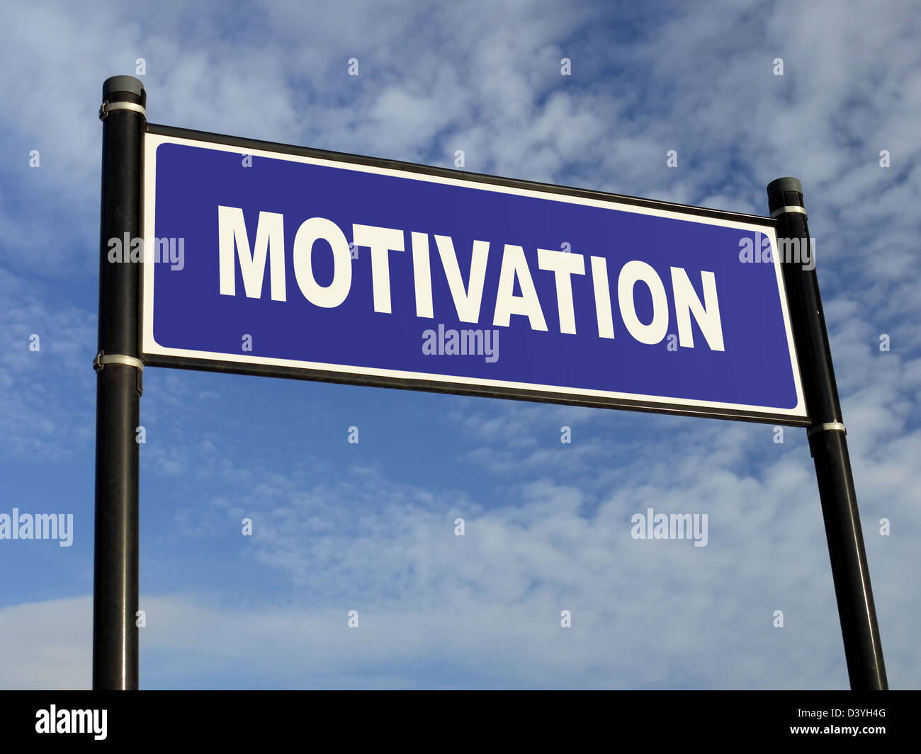 Metal roadsign spelling Motivation word over blue sky Stock Photo