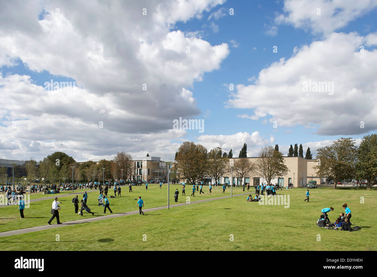 Thomas Tallis School, Greenwich, United Kingdom. Architect: John McAslan & Partners, 2012. Landscaped green grounds with walkway Stock Photo