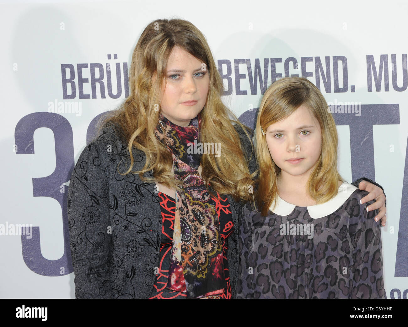 Munich, Germany. 26th February 2013. The former abduction victim Natascha Kampusch  and actress Amelia Pidgeon, who plays the part of Kampush as a littel girl, attend the premier of the film '3096 Tage' (3096 Days) in Munich, Germany, 26 February 2013. The film retells the story of Kampusch and her abduction. The film will start in cinemas across Germany on 28 February 2013. Photo: Ursula Dueren/dpa/Alamy Live News Stock Photo