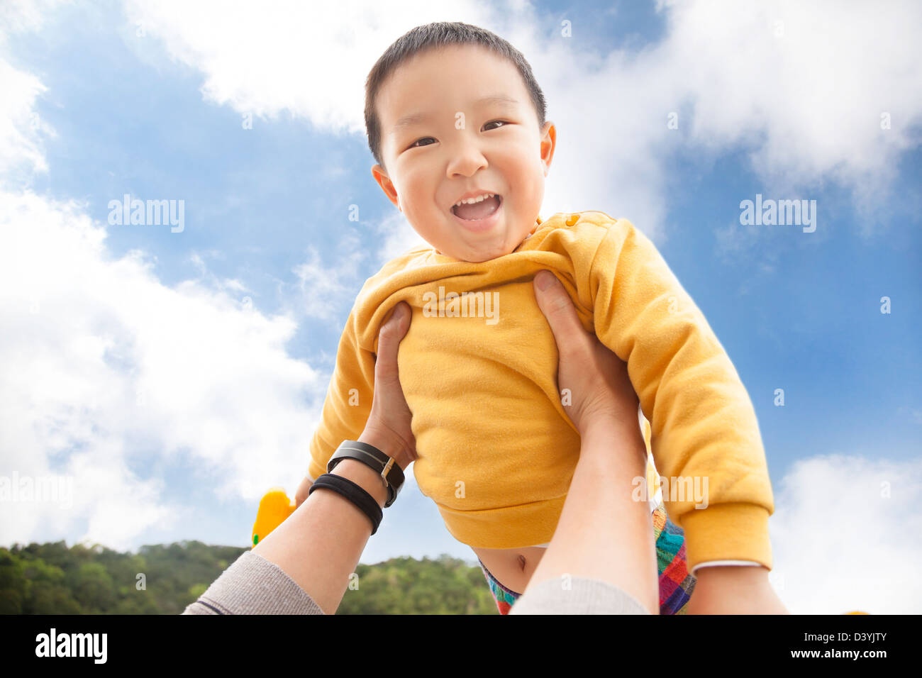 happy asian kid with cloud background Stock Photo