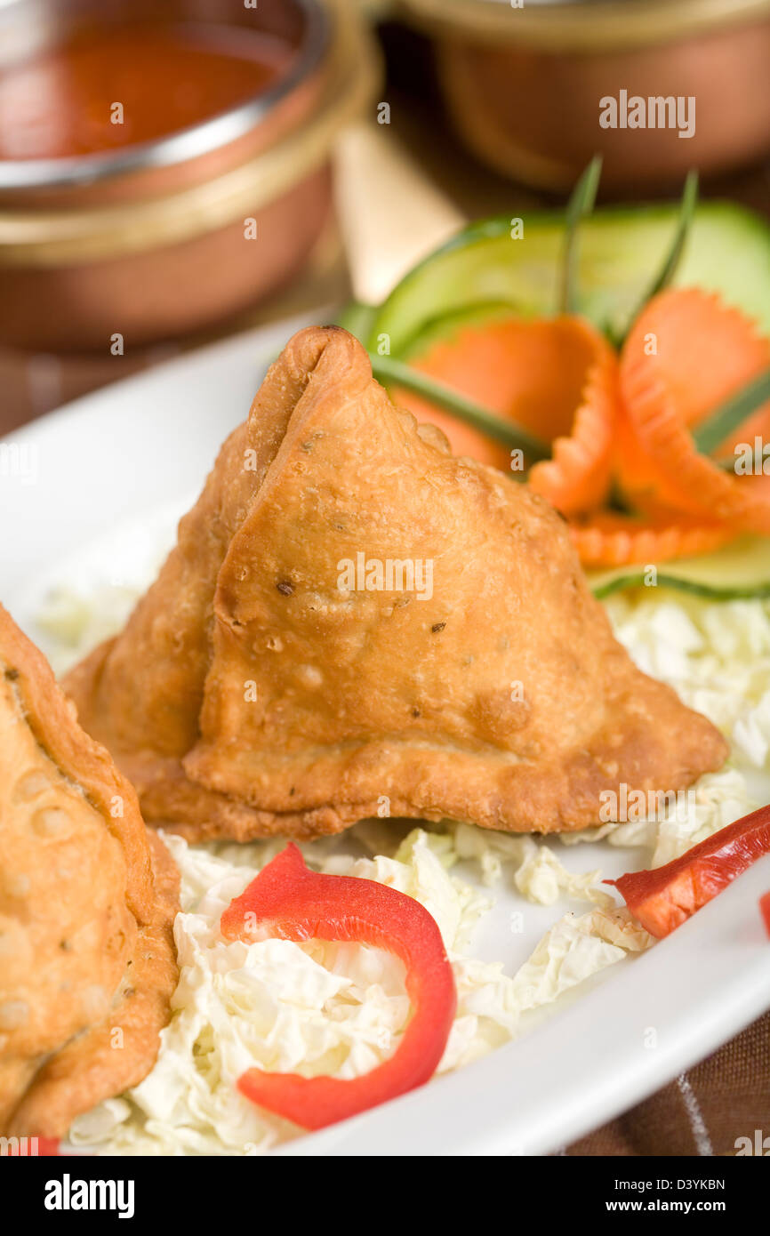 Vegetarian Aloo Samosa Or Samosas Indian Special Traditional Street Food  Famous Indian Punjabi Samosa Filled With Spicy Boiled Potato Mixture Served  With Green And Red Chutneys Copy Space Stock Photo - Download