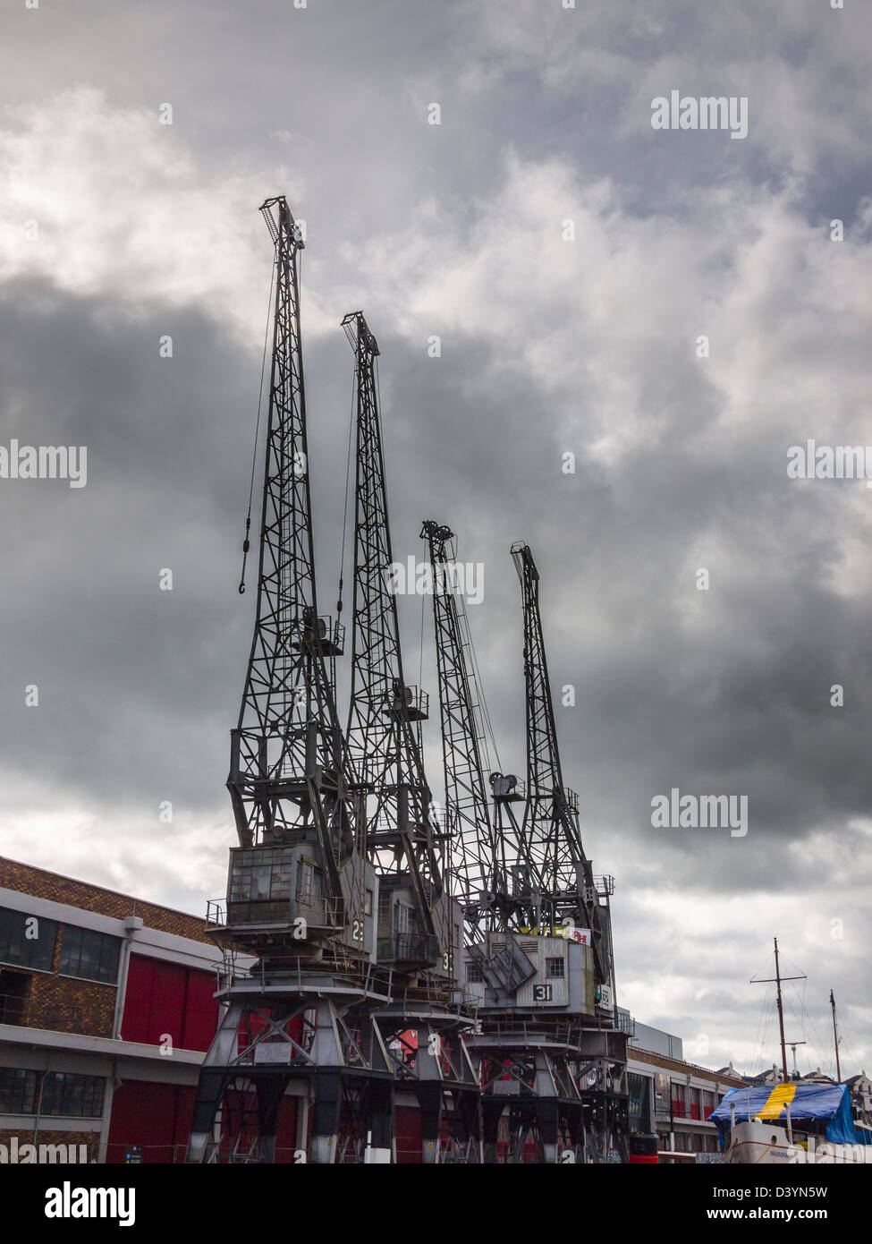Cranes outside the M Shed Museum on the Quayside at Bristol Harbour, England Stock Photo