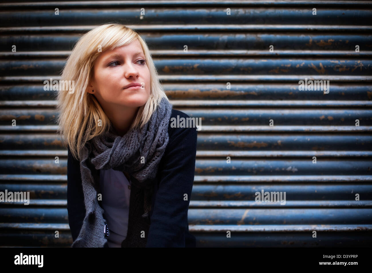 Young beautiful urban girl staring copy space. Stock Photo