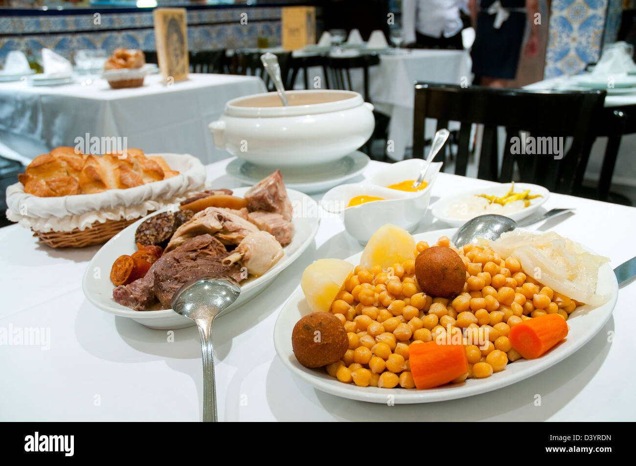 Cocido madrileño in a typical restaurant. Madrid, Spain. Stock Photo