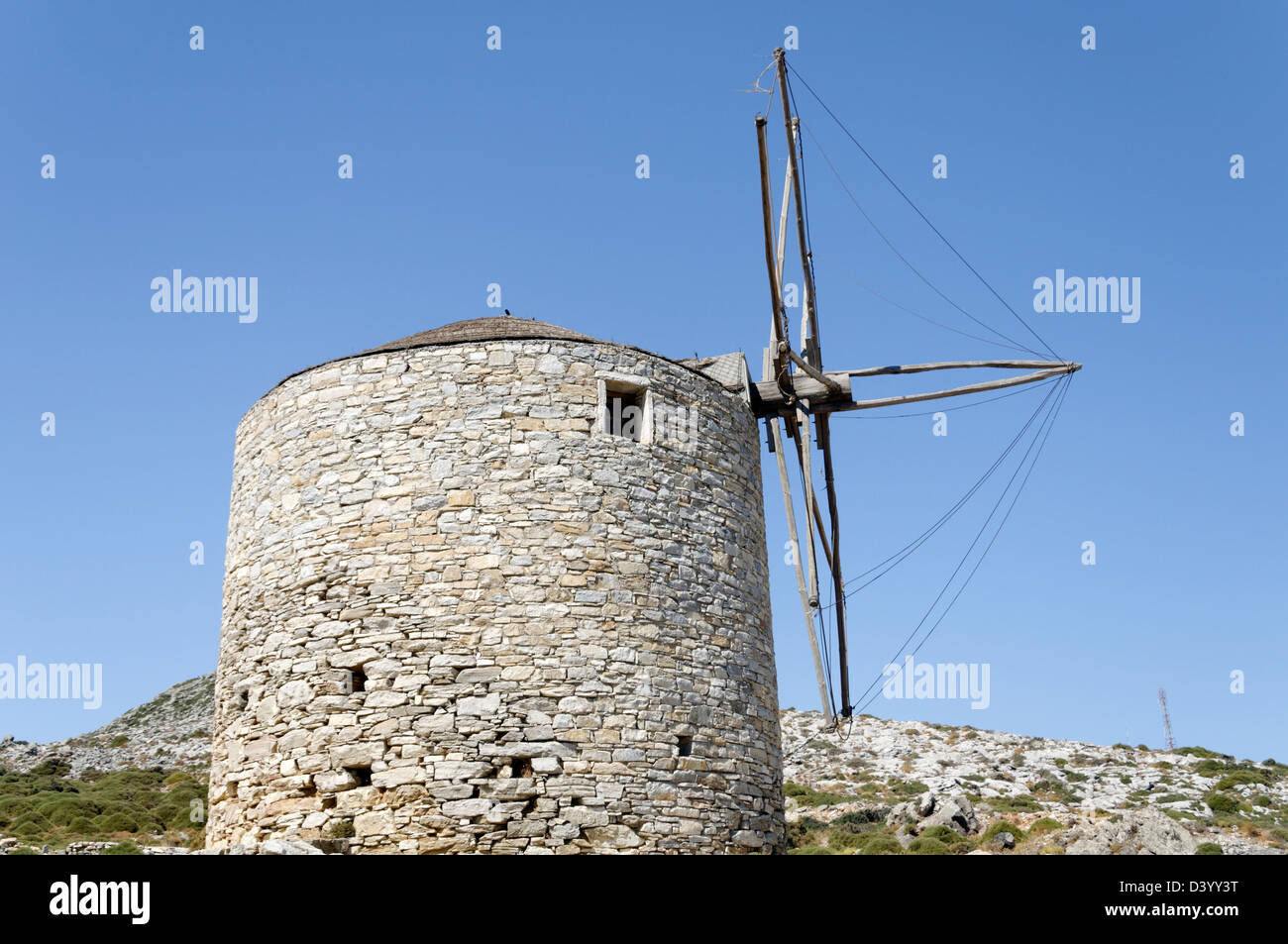 Naxos. Cyclades. Greece. An old traditional windmill found in the interior of the island of Naxos. Stock Photo