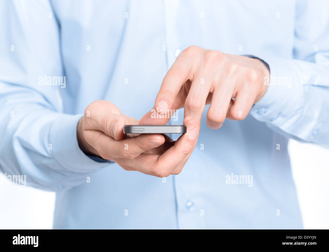 Businessman holding and touching screen on mobile phone. Close-up photo. Stock Photo