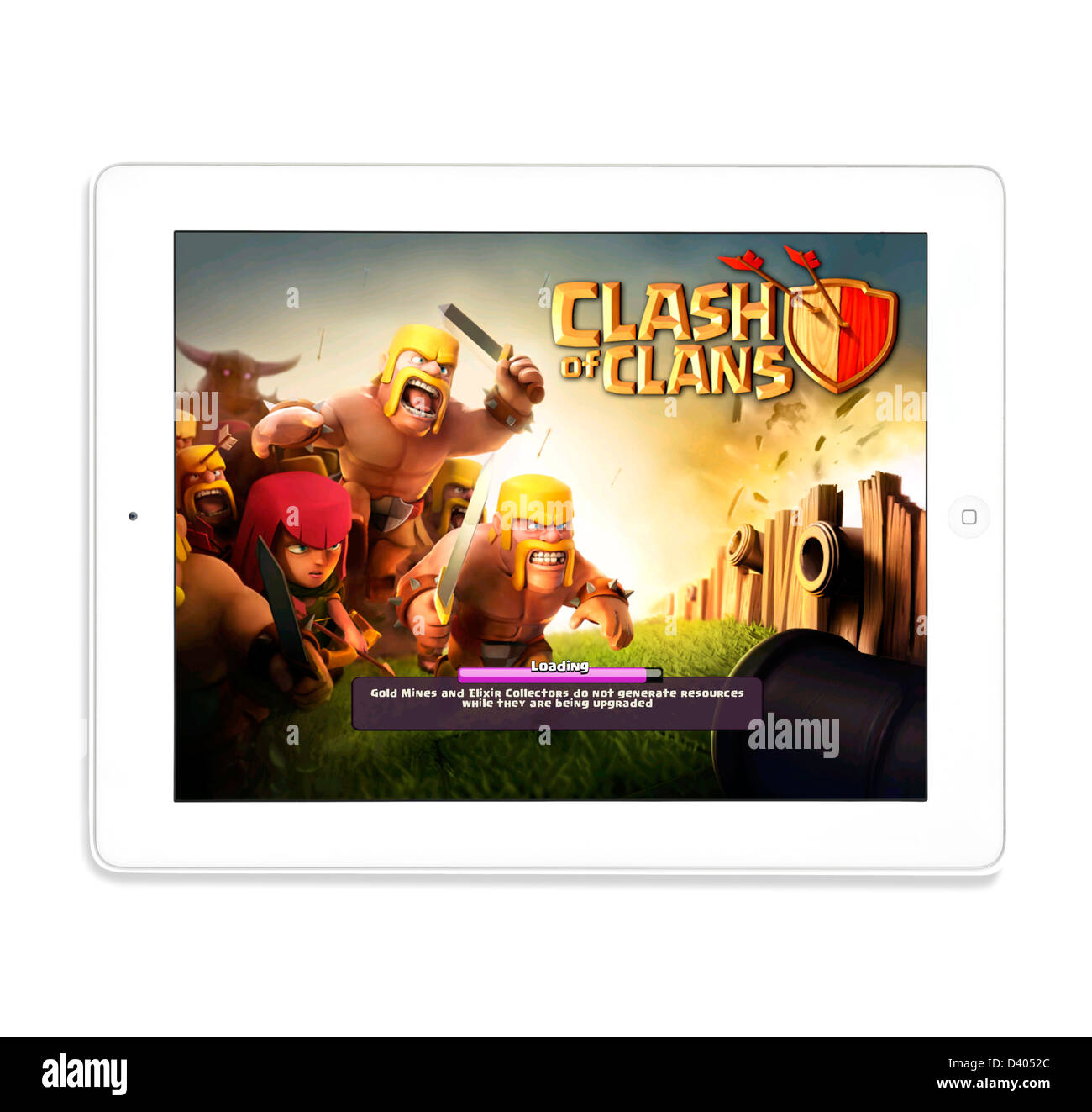 Playing the popular free game Clash of Clans on a 4th generation iPad Stock Photo