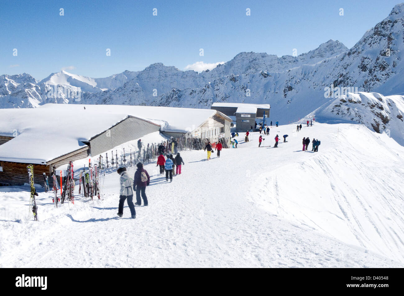 People skiing at the Hornli ski lift, Arosa resort, the Alps, Switzerland, Europe Stock Photo