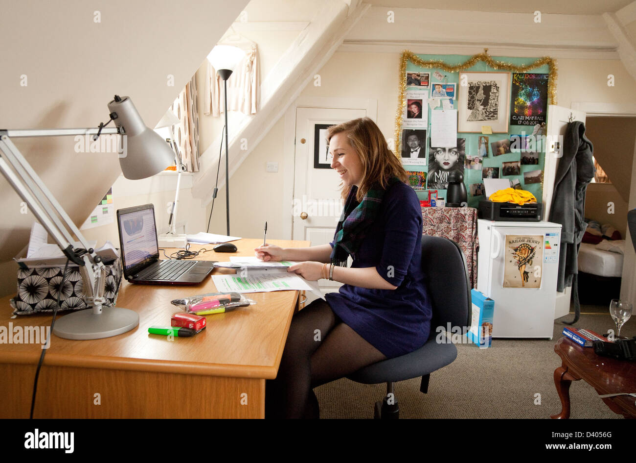 A Cambridge University student studying in her College room, Clare College,  Cambridge UK Stock Photo - Alamy