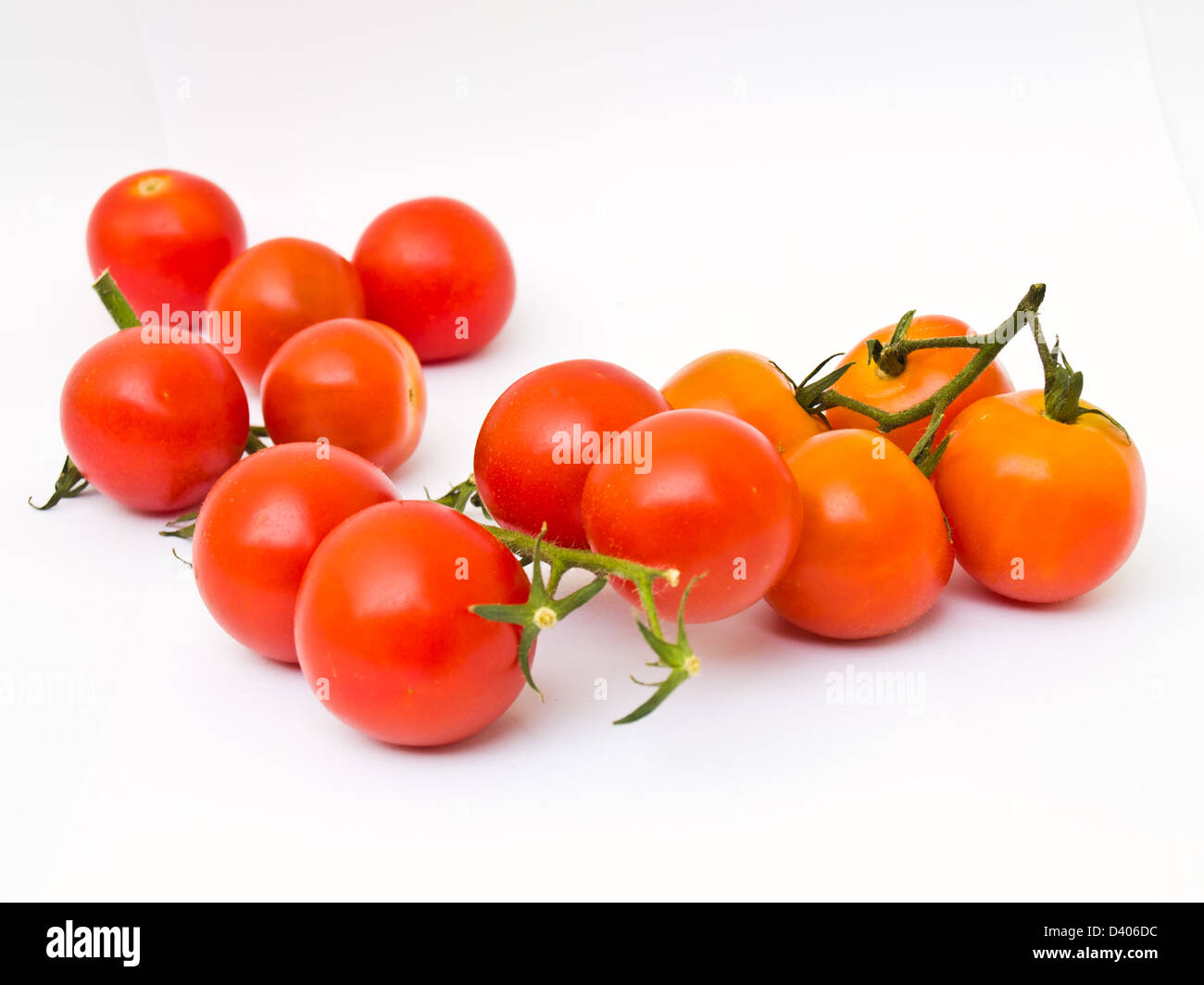 Cherry tomatoes isolated on white background Stock Photo - Alamy