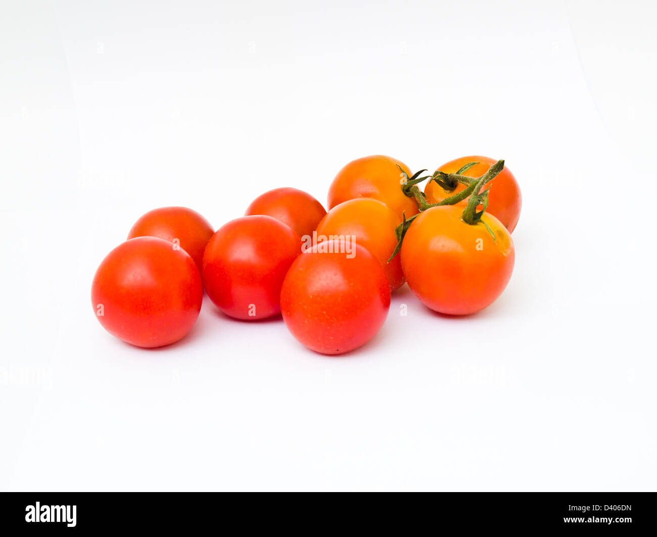 Cherry tomatoes isolated on white background Stock Photo - Alamy