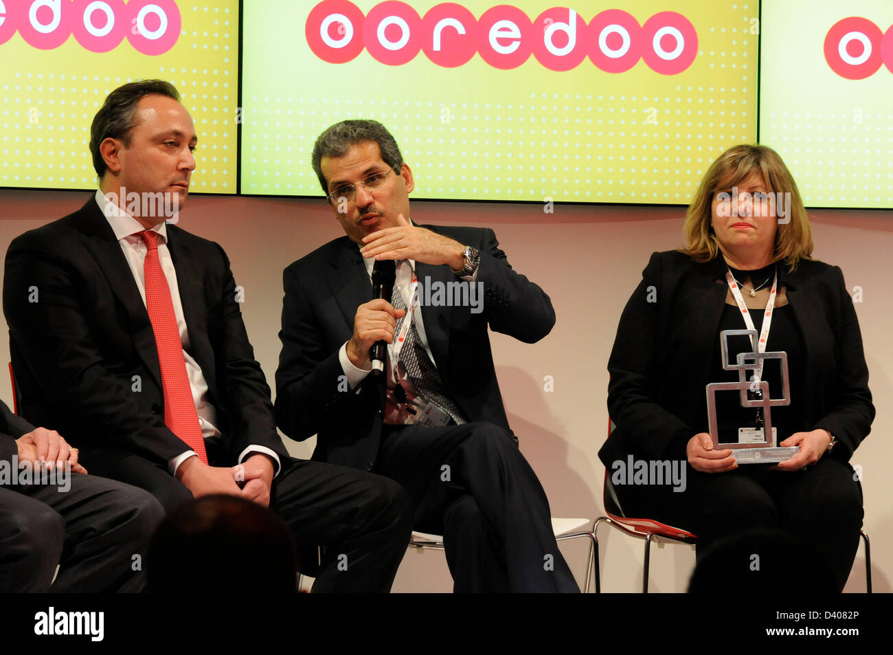 Qatar's Qtel has renamed itself Ooredoo in a bid to bring all its international businesses under a single brand identity the announcement came on Monday evening at Mobile World Congress in Barcelona 2013. The group  GEO Dr. Nasser Marafih explain the desition facts in the OOREDOO stand, Barcelona. 260213. Foto: Rosmi Duaso Stock Photo