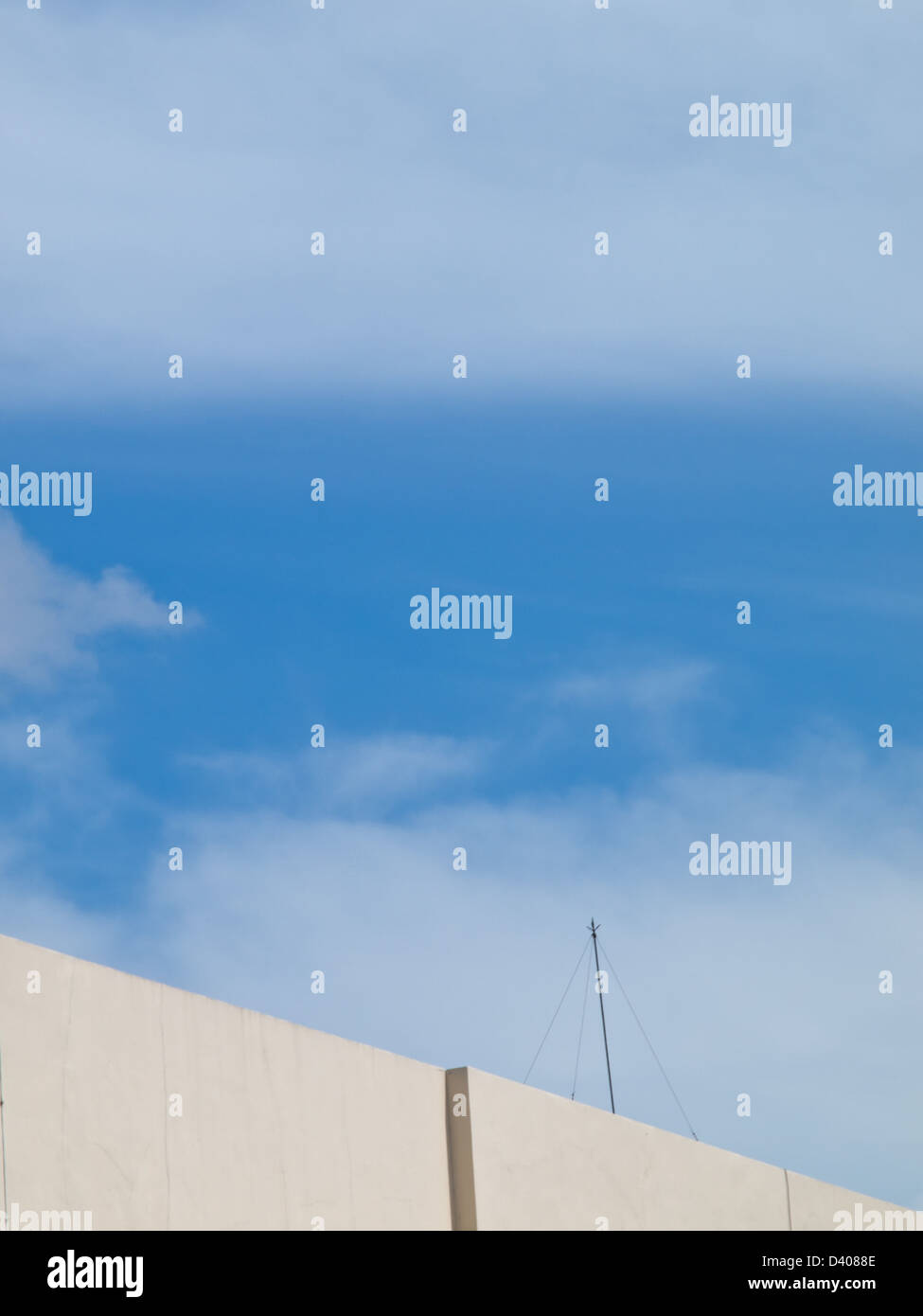 White wall and blue sky Stock Photo - Alamy
