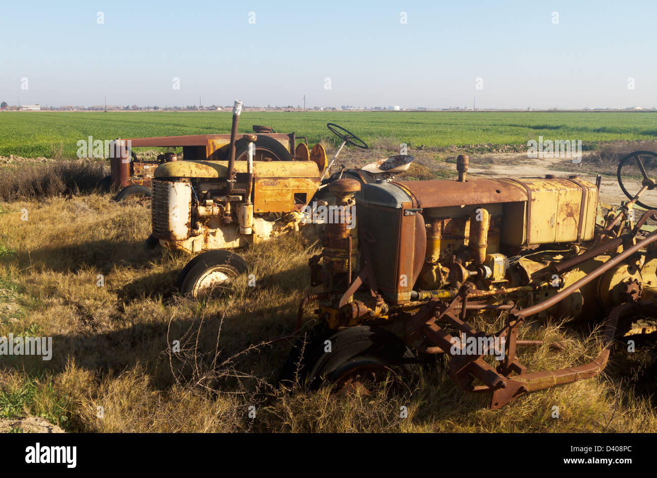 Rusty abandoned vintage farm machinery Stock Photo