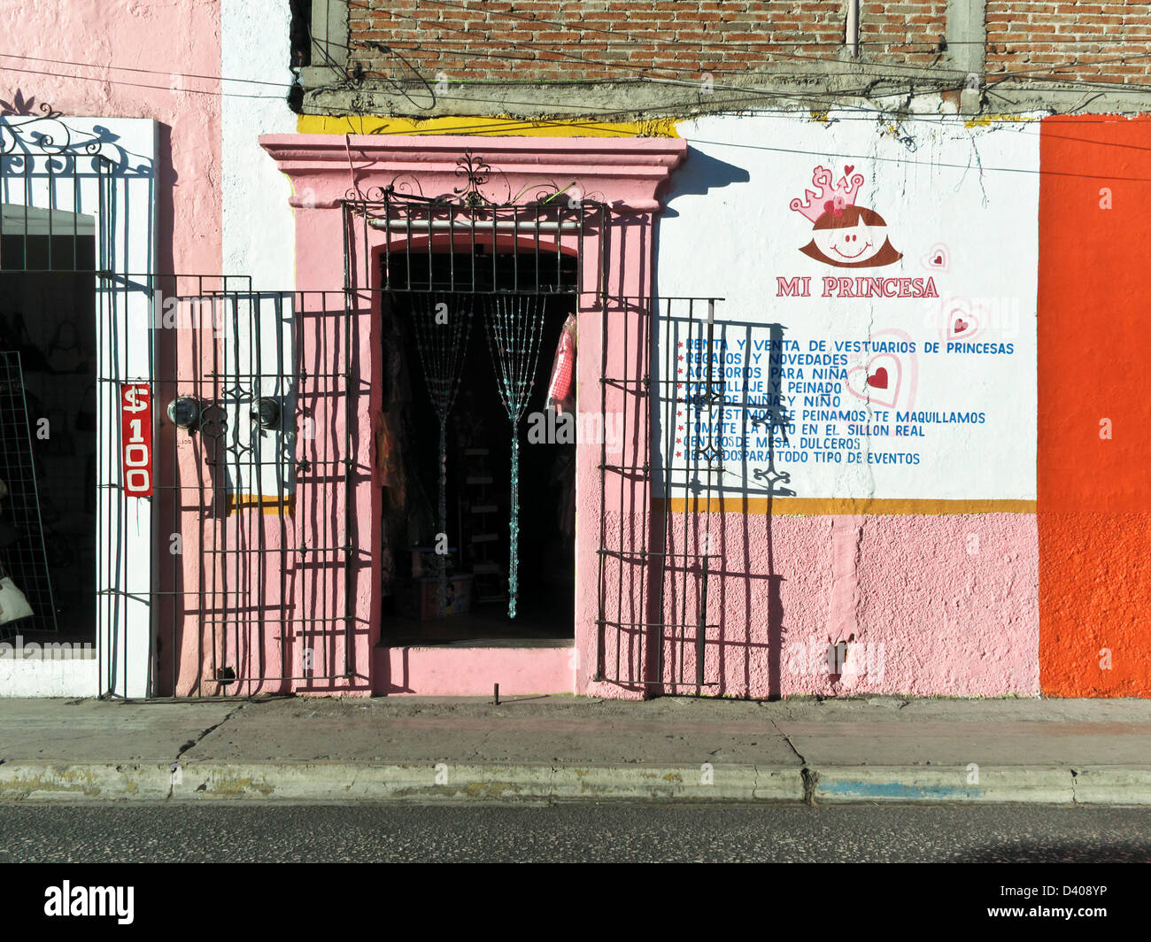 colorful pink facade street front of small shop for little girls