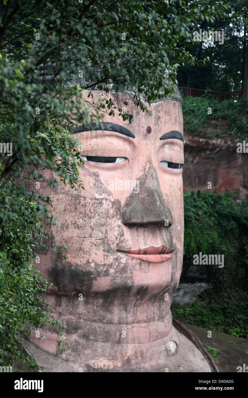 It's a photo of The biggest Buddha statue in the world - 71 meters. Leshan, Sichuan province, China. Stock Photo