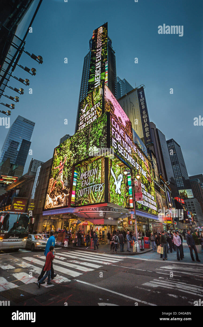 Tourists take in the sights and bright lights of Times Square New York